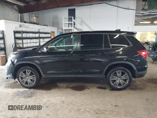 2020 Honda Passport EX-L z VIN 5FNYF8H5XLB005518, wystawiony jako IAAI lot #42021512 z przebiegiem 79 573 mil mil oraz . Historia ofert i sprzedaży dostępna na DreamBid. Obrazek 14.
