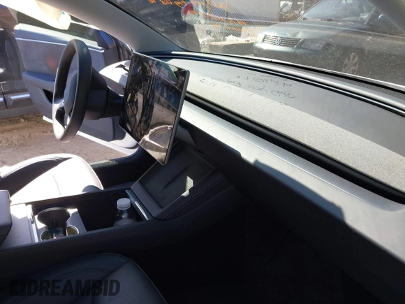 2025 Tesla Model 3 Long Range with VIN 5YJ3E1EB4SF914979, listed as a IAAI auction lot 41695023 with 2,263 mi miles and . Bid and sale history available at DreamBid. Image 5.