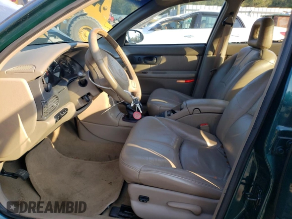 1997 Buick Regal GS with VIN 2G4WF5211V1479225, listed as a Copart auction lot 75203384 with 65,859 mi miles and Salvage Title. Bid and sale history available at carsss.com. Image 7.