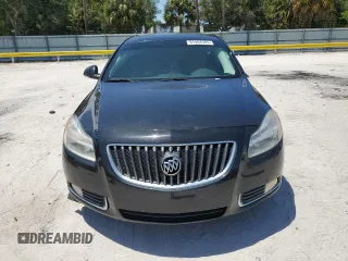 2013 Buick Regal Turbo Premium 1 z VIN 2G4GS5EV3D9221173, wystawiony jako Copart lot #61904305 z przebiegiem 144 600 mil mil oraz Szkoda całkowita • Salvage title. Historia ofert i sprzedaży dostępna na DreamBid. Obrazek 5.