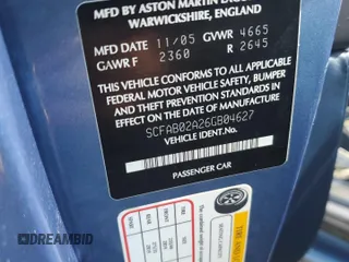 2006 Aston Martin DB9 z VIN SCFAB02A26GB04627, wystawiony jako Copart lot #68314504 z przebiegiem Nie podano mil oraz Szkody całkowita. Historia ofert i sprzedaży dostępna na DreamBid. Obrazek 12.