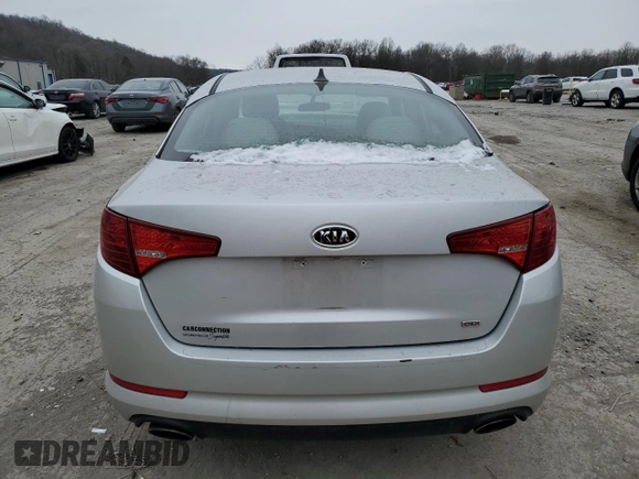 2013 Kia Optima EX z VIN 5XXGN4A7XDG144632, wystawiony jako Copart lot #83599614 z przebiegiem 97 316 mil mil oraz Szkoda całkowita • Salvage title. Historia ofert i sprzedaży dostępna na DreamBid. Obrazek 6.