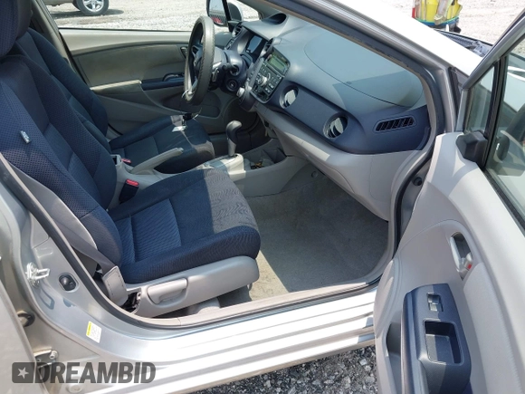 2010 Honda Insight EX with VIN JHMZE2H7XAS018581, listed as a IAAI auction lot 42398439 with 188,692 mi miles and . Bid and sale history available at DreamBid. Image 5.