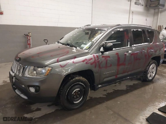 2012 Jeep Compass Latitude with VIN 1C4NJDEB8CD655864, listed as a IAAI auction lot 41250034 with 121,509 mi miles. Bid and sale history available at carsss.com. Image 2.
