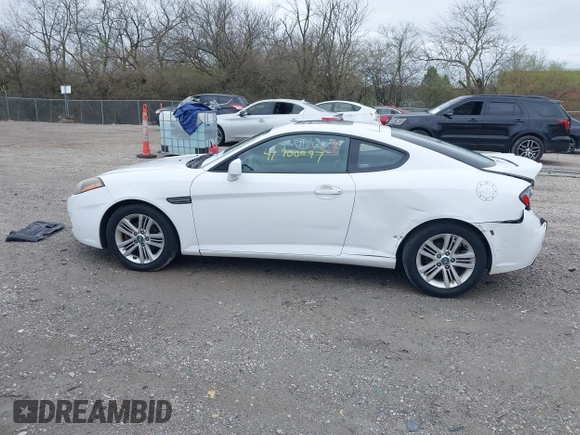 2008 Hyundai Tiburon GS z VIN KMHHM66D58U283273, wystawiony jako IAAI lot #41900097 z przebiegiem 154 013 mil mil oraz . Historia ofert i sprzedaży dostępna na DreamBid. Obrazek 15.