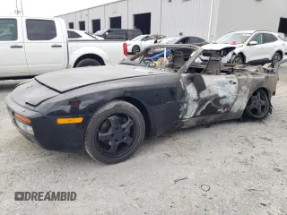 1990 Porsche 944 with VIN WP0CB2941LN480419, listed as a Copart auction lot 49886935 with Not provided miles and Salvage title. Bid and sale history available at DreamBid. Image 1.