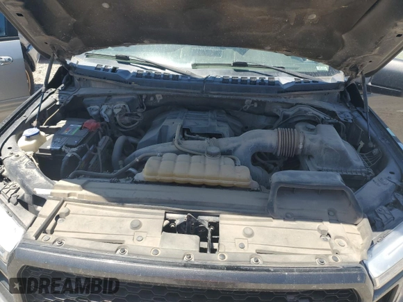 2018 Ford F-150 XL with VIN 1FTEW1EPXJKE71093, listed as a Copart auction lot 63812265 with 122,361 mi miles and Salvage title. Bid and sale history available at DreamBid. Image 11.