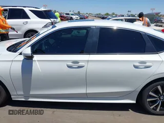 2024 Honda Civic EX z VIN 2HGFE1F70RH320192, wystawiony jako IAAI lot #42282169 z przebiegiem 11 136 mil mil oraz . Historia ofert i sprzedaży dostępna na DreamBid. Obrazek 14.