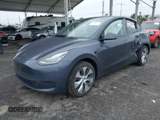 2023 Tesla Model Y Long Range with VIN 7SAYGDEE3PA152683, listed as a IAAI auction lot 41798988 with 14,063 mi miles and . Bid and sale history available at carsss.com. Image 17.