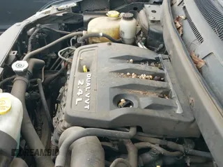 2012 Dodge Journey American Value z VIN 3C4PDCAB2CT296554, wystawiony jako IAAI lot #42711875 z przebiegiem 193 921 mil mil oraz . Historia ofert i sprzedaży dostępna na DreamBid. Obrazek 12.