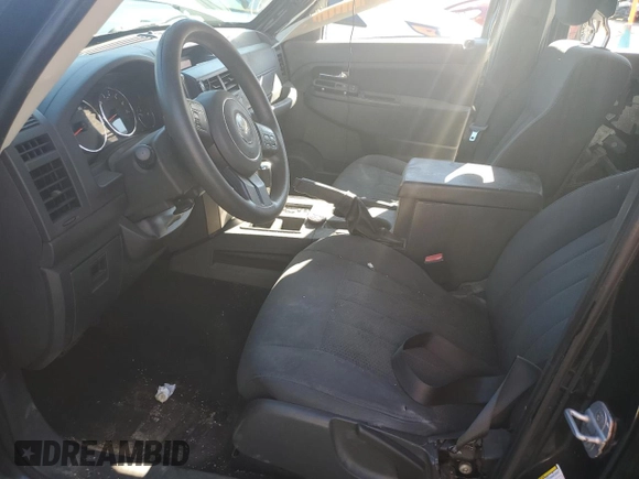 2012 Jeep Liberty Sport with VIN 1C4PJLAK4CW110404, listed as a Copart auction lot 47061095 with 216,103 mi miles and Salvage Title. Bid and sale history available at carsss.com. Image 7.