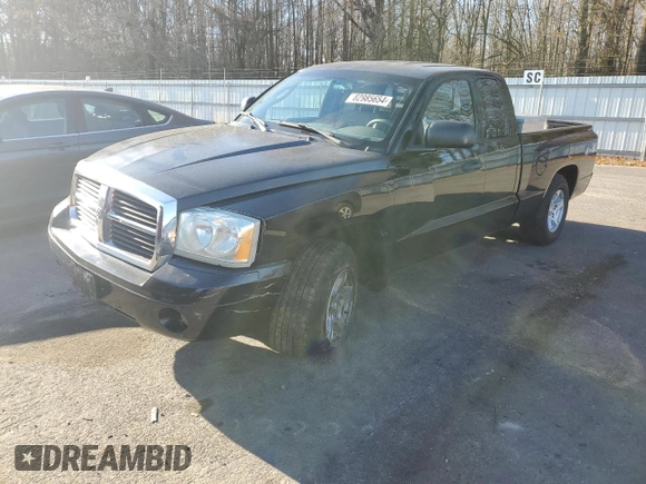 2006 Dodge Dakota SLT with VIN 1D7HW42K46S524262, listed as a Copart auction lot 82985654 with 124,170 mi miles and Salvage Title. Bid and sale history available at DreamBid. Image 1.