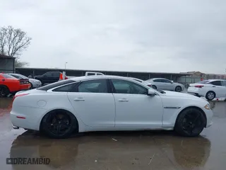 2012 Jaguar XJ with VIN SAJWA1CB7CLV35339, listed as a IAAI auction lot 41945850 with 123,501 mi miles. Bid and sale history available at carsss.com. Image 14.
