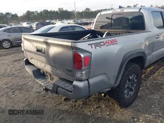 2021 Toyota Tacoma 4WD SR5 with VIN 5TFDZ5BN2MX063823, listed as a IAAI auction lot 41447098 with 52,538 mi miles. Bid and sale history available at carsss.com. Image 16.