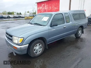 1997 Toyota Tacoma with VIN 4TAVL52N9VZ311363, listed as a IAAI auction lot 41939174 with 129,116 mi miles. Bid and sale history available at carsss.com. Image 2.