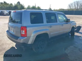 2014 Jeep Patriot Sport with VIN 1C4NJPBBXED859221, listed as a IAAI auction lot 39150084 with 105,102 mi miles. Bid and sale history available at carsss.com. Image 4.
