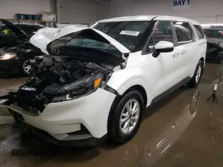 2023 Kia Carnival LX with VIN KNDNB4H39P6245635, listed as a Copart auction lot 77693694 with 26,752 mi miles and Salvage Title. Bid and sale history available at carsss.com. Image 1.