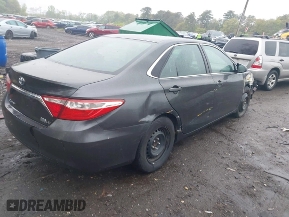 2015 Toyota Camry LE with VIN 4T1BD1FK8FU159177, listed as a IAAI auction lot 42149932 with 387,046 mi miles and . Bid and sale history available at DreamBid. Image 4.