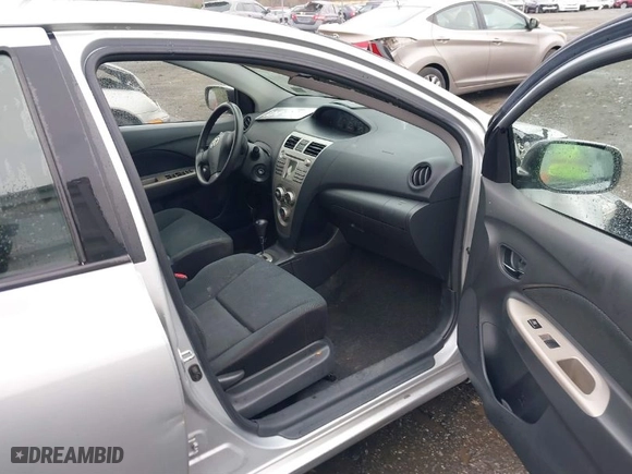 2010 Toyota Yaris with VIN JTDBT4K38A1363060, listed as a IAAI auction lot 41874903 with 170,398 mi miles. Bid and sale history available at carsss.com. Image 5.