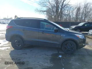 2016 Ford Escape SE z VIN 1FMCU0GX9GUC24175, wystawiony jako IAAI lot #41603394 z przebiegiem 73 255 mil mil oraz . Historia ofert i sprzedaży dostępna na DreamBid. Obrazek 12.