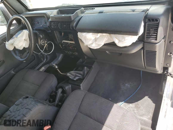2005 Jeep Wrangler Sport z VIN 1J4FA49S75P324462, wystawiony jako Copart lot #59818995 z przebiegiem 183 558 mil mil oraz Nie do naprawy • Non repairable. Historia ofert i sprzedaży dostępna na DreamBid. Obrazek 8.