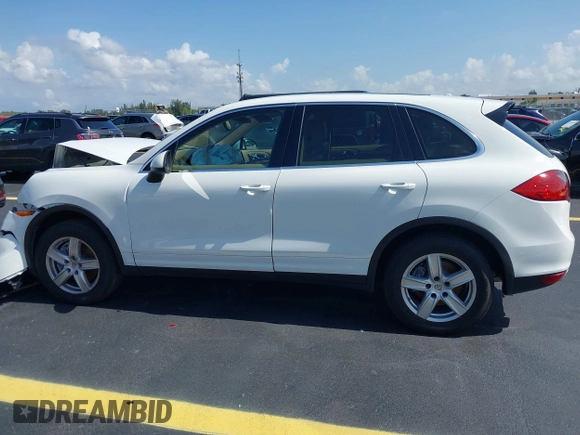 2014 Porsche Cayenne with VIN WP1AA2A20ELA02638, listed as a IAAI auction lot 42349570 with 113,355 mi miles and . Bid and sale history available at DreamBid. Image 14.