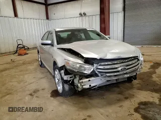 2013 Ford Taurus SEL z VIN 1FAHP2E82DG174647, wystawiony jako Copart lot #53784995 z przebiegiem Nie podano mil oraz Szkoda całkowita • Salvage title. Historia ofert i sprzedaży dostępna na DreamBid. Obrazek 13.