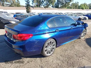 2019 BMW 5 Series M550i xDrive z VIN WBAJB9C54KB288992, wystawiony jako IAAI lot #41302127 z przebiegiem 48 418 mil mil oraz . Historia ofert i sprzedaży dostępna na DreamBid. Obrazek 4.
