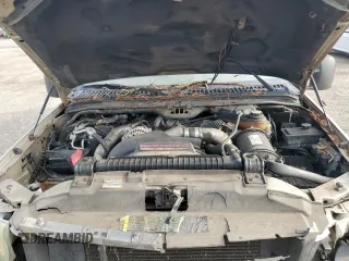 2004 Ford Excursion Limited z VIN 1FMNU42P64EA06742, wystawiony jako Copart lot #71989004 z przebiegiem 238 839 mil mil oraz Szkoda całkowita • Salvage title. Historia ofert i sprzedaży dostępna na DreamBid. Obrazek 13.