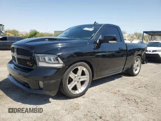 2014 Ram 1500 R/T with VIN 3C6JR6CT9EG181094, listed as a Copart auction lot 62785065 with 128,380 mi miles and Salvage title. Bid and sale history available at DreamBid. Image 1.