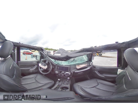2015 Jeep Wrangler Rubicon with VIN 1C4HJWCG0FL755717, listed as a Copart auction lot 61375435 with 153,207 mi miles and Salvage title. Bid and sale history available at DreamBid. Image 16.