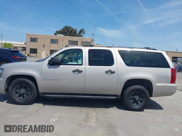 2007 Chevrolet Suburban LS with VIN 1GNFC16027J202168, listed as a IAAI auction lot 42100210 with Not Provided miles and . Bid and sale history available at DreamBid. Image 14.