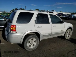 2006 Ford Escape Hybrid with VIN 1FMYU96H16KC06753, listed as a Copart auction lot 66938664 with 157,518 mi miles and Salvage Title. Bid and sale history available at carsss.com. Image 3.