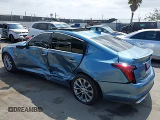 2024 Cadillac CT5 Premium Luxury z VIN 1G6DN5RK3R0110352, wystawiony jako IAAI lot #41885792 z przebiegiem 13 663 mil mil oraz . Historia ofert i sprzedaży dostępna na DreamBid. Obrazek 3.