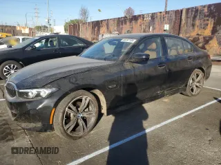 2023 BMW 3 Series 330e with VIN 3MW39FF03P8D33433, listed as a Copart auction lot 86197104 with 12,023 mi miles and Salvage Title. Bid and sale history available at carsss.com. Image 1.