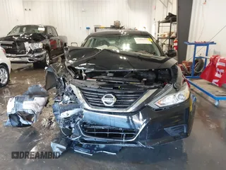 2018 Nissan Altima 2.5 SR with VIN 1N4AL3AP5JC185905, listed as a IAAI auction lot 41899469 with 56,927 mi miles. Bid and sale history available at carsss.com. Image 12.