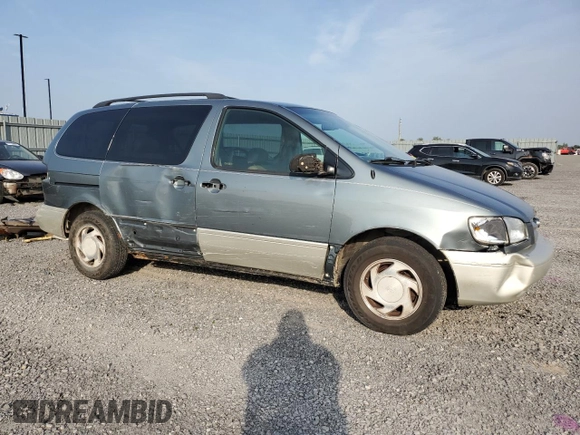 1998 Toyota Sienna LE with VIN 4T3ZF13C7WU074909, listed as a Copart auction lot 72345864 with 452,598 mi miles and Clean Title. Bid and sale history available at carsss.com. Image 4.