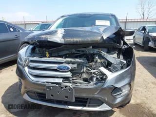 2017 Ford Escape SE z VIN 1FMCU0GD9HUD28110, wystawiony jako IAAI lot #41903505 z przebiegiem 66 808 mil mil oraz . Historia ofert i sprzedaży dostępna na DreamBid. Obrazek 13.