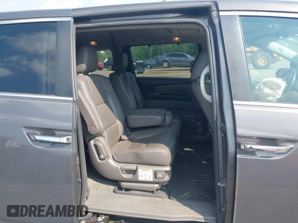 2014 Honda Odyssey EX-L with VIN 5FNRL5H6XEB121390, listed as a IAAI auction lot 42480217 with 291,766 mi miles and . Bid and sale history available at DreamBid. Image 8.
