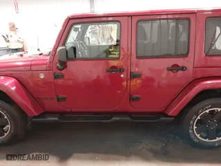 2012 Jeep Wrangler Unlimited Sahara with VIN 1C4BJWEG0CL256852, listed as a IAAI auction lot 41765640 with 171,408 mi miles. Bid and sale history available at carsss.com. Image 15.