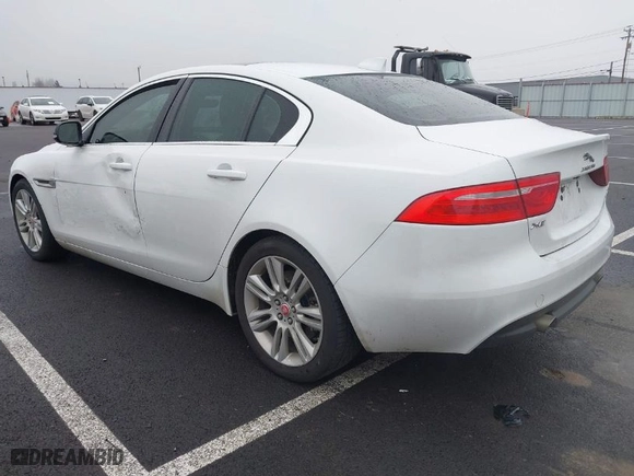 2019 Jaguar XE 25t with VIN SAJAR4FX0KCP52659, listed as a IAAI auction lot 41332080 with 96,936 mi miles. Bid and sale history available at carsss.com. Image 3.