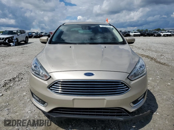 2017 Ford Focus Titanium с VIN 1FADP3J28HL256188, выставлен на аукционе Copart как лот 56500435 с пробегом 88 239 миль миль и Списание • Salvage title. История ставок и продаж доступна на DreamBid. Изображение 5.