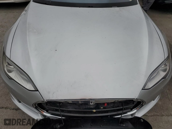 2014 Tesla Model S 60 with VIN 5YJSA1H14EFP34335, listed as a Copart auction lot 65504325 with Not provided miles and Clean title. Bid and sale history available at DreamBid. Image 11.