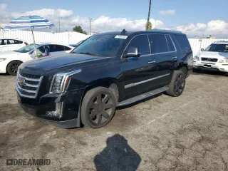 2020 Cadillac Escalade Luxury with VIN 1GYS3BKJXLR182043, listed as a Copart auction lot 77366104 with 113,255 mi miles and Salvage Title. Bid and sale history available at carsss.com. Image 1.