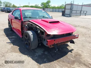 2004 Ford Mustang GT Deluxe z VIN 1FAFP42XX4F210024, wystawiony jako IAAI lot #42119586 z przebiegiem 176 164 mil mil oraz . Historia ofert i sprzedaży dostępna na DreamBid. Obrazek 1.