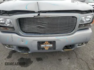 2000 GMC Denali z VIN 1GKEK13RXYR110436, wystawiony jako Copart lot #74311244 z przebiegiem 250 735 mil mil oraz Szkody całkowita. Historia ofert i sprzedaży dostępna na DreamBid. Obrazek 12.