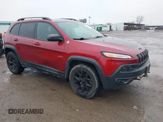 2017 Jeep Cherokee Trailhawk z VIN 1C4PJMBS3HW565630, wystawiony jako IAAI lot #41432580 z przebiegiem 152 862 mil mil oraz . Historia ofert i sprzedaży dostępna na DreamBid. Obrazek 1.