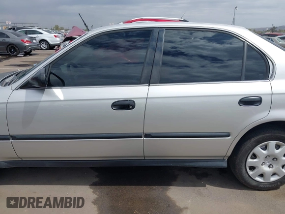 1999 Honda Civic LX with VIN JHMEJ6671XS003027, listed as a IAAI auction lot 41825146 with 197,764 mi miles and . Bid and sale history available at DreamBid. Image 14.