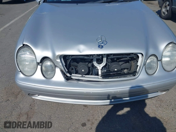 2002 Mercedes-Benz CLK 320/430 z VIN WDBLK70G12T129233, wystawiony jako IAAI lot #42391247 z przebiegiem 94 186 mil mil oraz . Historia ofert i sprzedaży dostępna na DreamBid. Obrazek 6.