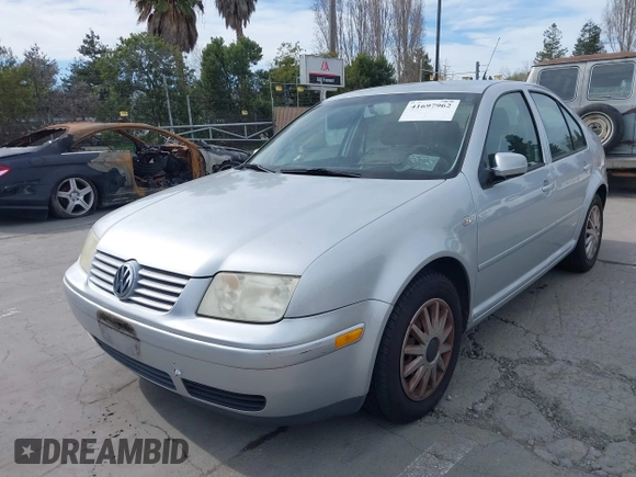 2003 Volkswagen Jetta GL with VIN 3VWRK69M43M045127, listed as a IAAI auction lot 41697962 with 119,065 mi miles and . Bid and sale history available at DreamBid. Image 2.